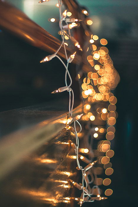 Beautiful Christmas bokeh lights in the background of a string of fairy lights