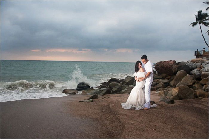 Beautiful wedding portrait of the couple posing on a beach