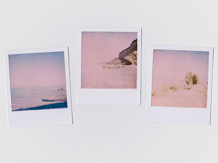 Three Polaroid photos with a washed out effect, pink highlights, and blue shadows. filmic photography. 