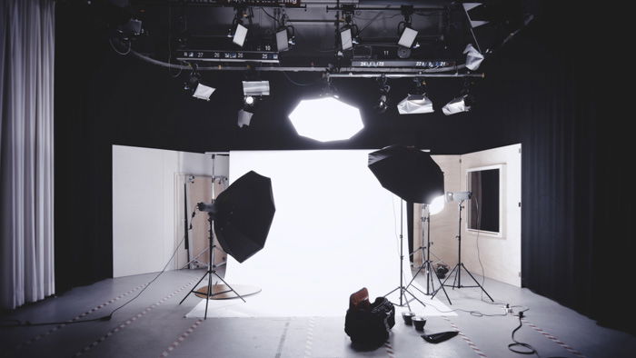 A set with cameras and lighting equipment.