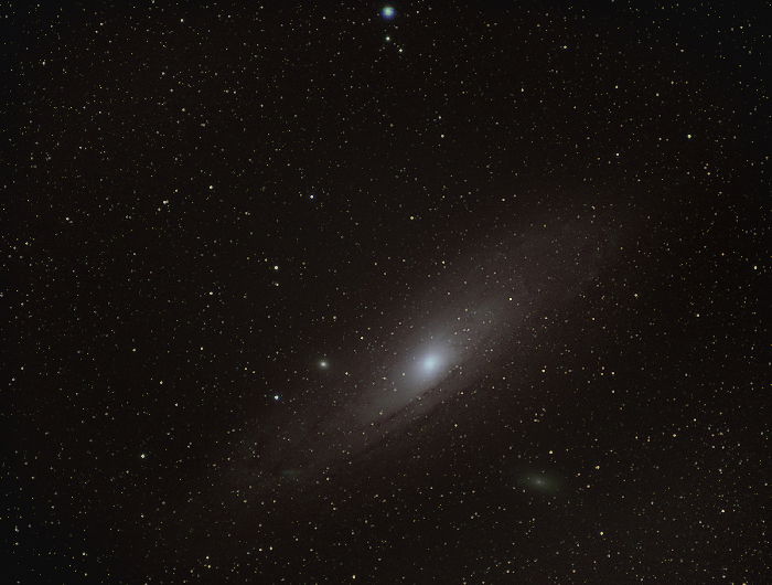 Andromeda in the night sky, flipped horizontally and vertically.