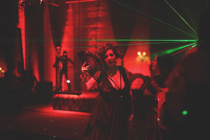 Atmospheric nightclub photography portrait of a female dancer