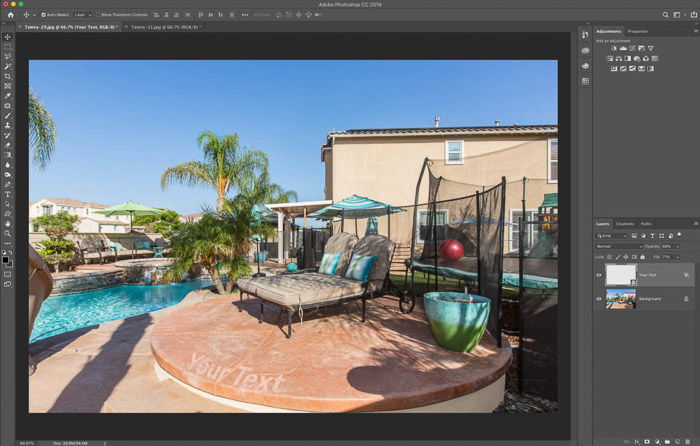 A screenshot showing how to use the Photoshop warp tool for real estate photography - Final image with text slightly textured as a blend layer 