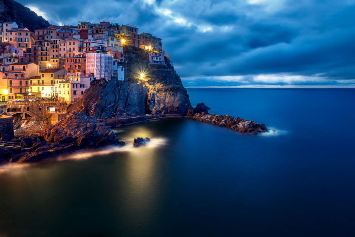 A stunning coastal shot of Manarola by Night