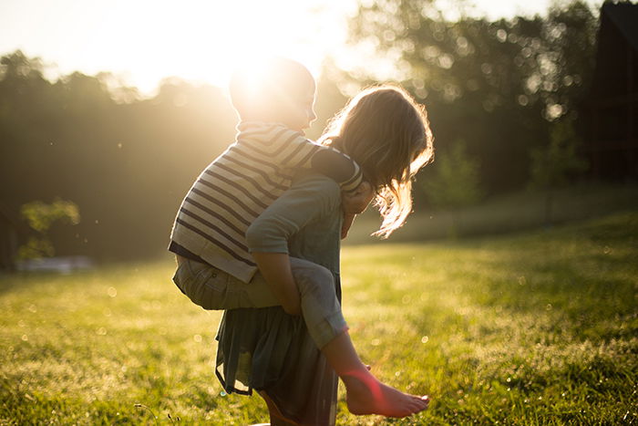 A candid portrait of children playing outdoors 