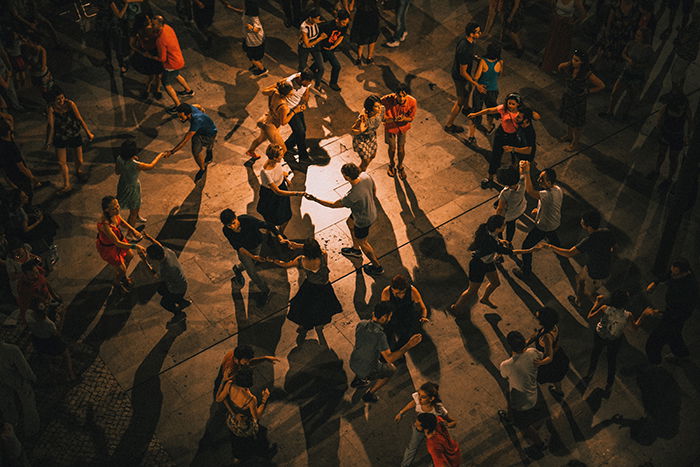 A high angle shot of people dancing indoors