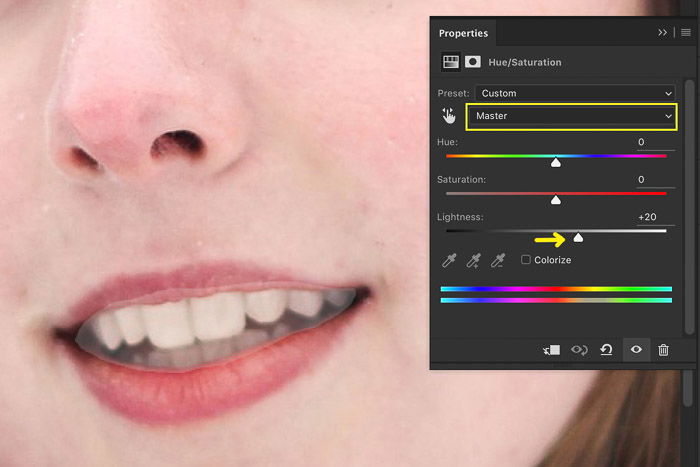 A screenshot showing how to brighten teeth using hue saturation adjustment in Photoshop 