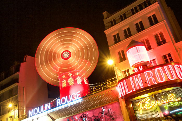 The Moulin Rouge at night using a long exposure.