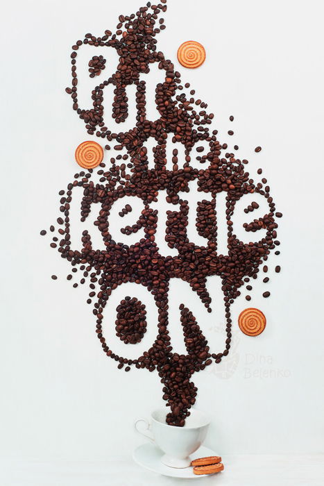 A creative still life using food typography made from coffee beans spelling 'put the kettle on' - examples of typography