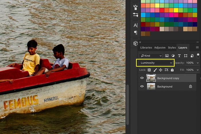 A screenshot showing how to sharpen an image in Photoshop using a photo of a small boat in a lake