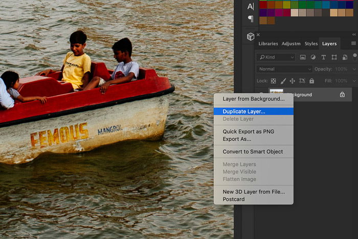 A screenshot showing how to sharpen images in Photoshop using a photo of a small boat in a lake