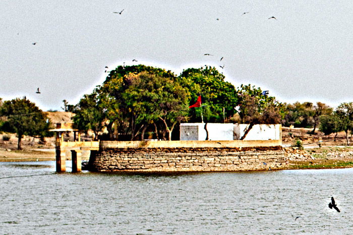 An over sharpened image of a manmade structure in a lake