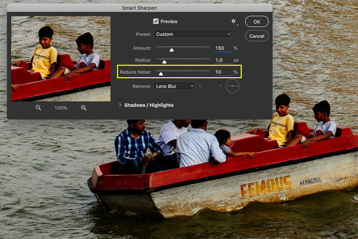 Screenshot of editing an image in Photoshop showing a row boat in India.