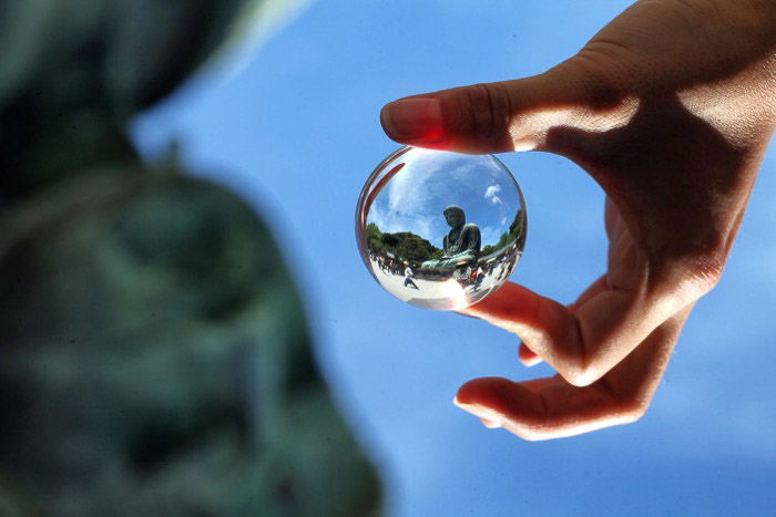 The giant Buddha in Kamakura, captured inside a lensball.