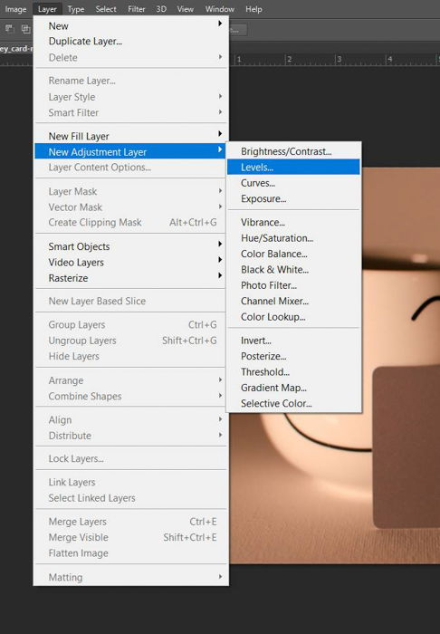 A screenshot showing how to do color correction in Photoshop with a grey card