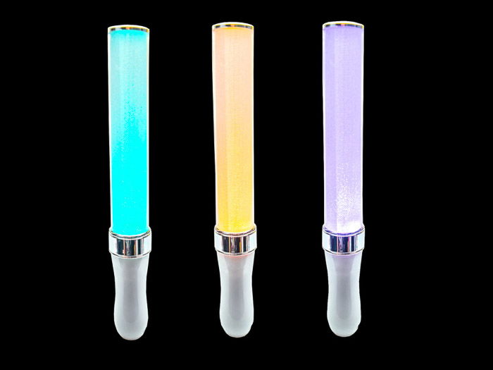 Three LED light sticks on a black background 