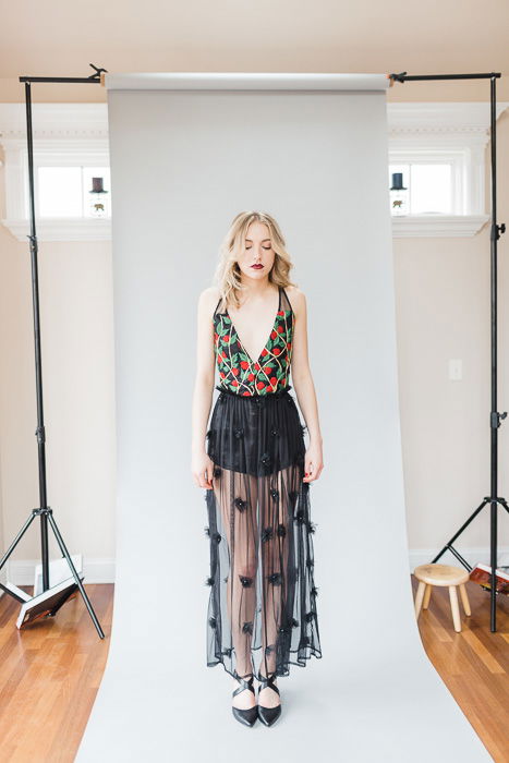 A female model posing in a studio - photography studio equipment