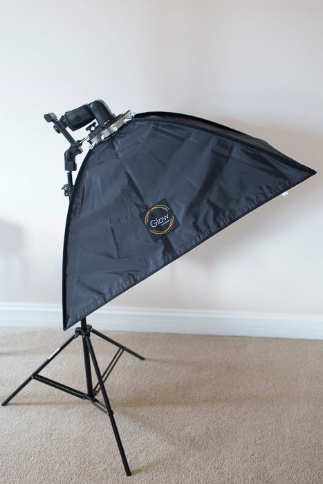 A basic portable softbox with just an external flash trigged from off-camera setup.