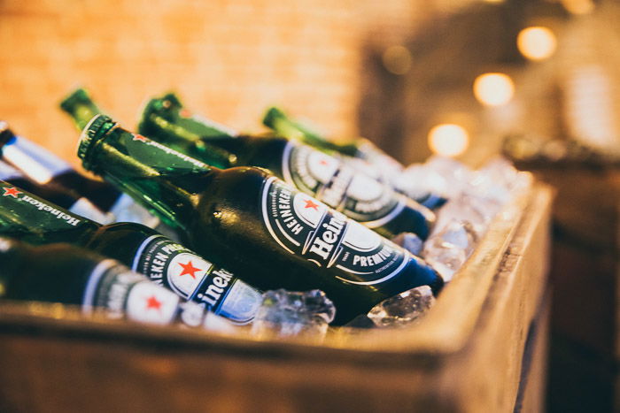 A crate of heineken bottles in ice - how to take beer pictures 