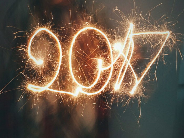 '2017' written in sparkly light painting shot at night using LED light painting tools