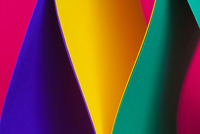 Brightly colored abstract photo made using sheets of colored paper