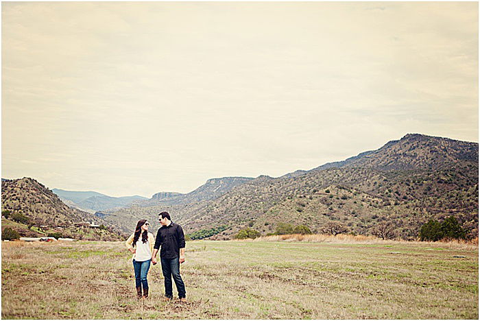 A romantic portrait of a couple posing outdoors - emotional photography