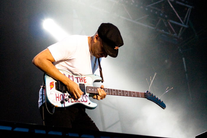 A concert photography image of a Tom Morello