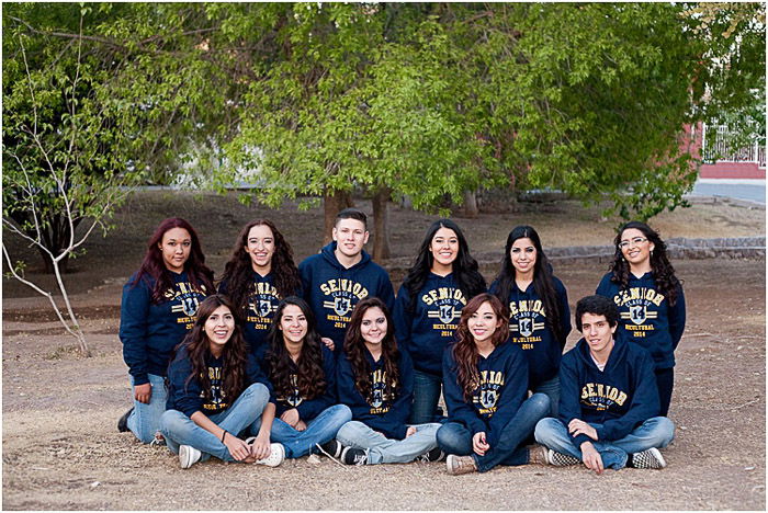 A group of teenagers posing for a class photo