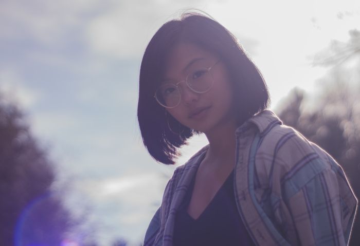 portrait photo of a girl with lens flare