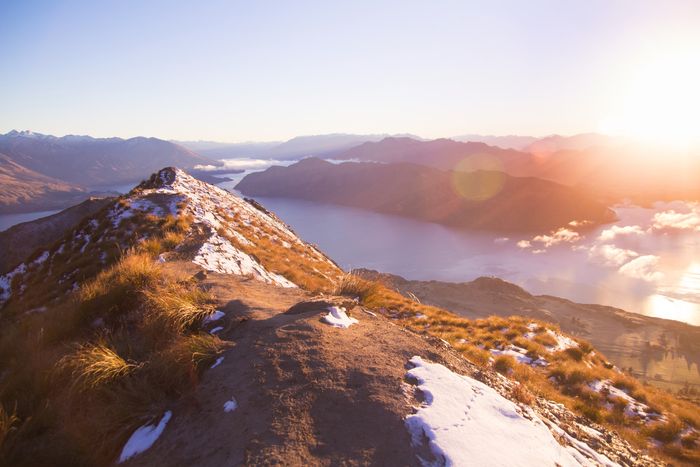 photo of a mountain range with lens flare