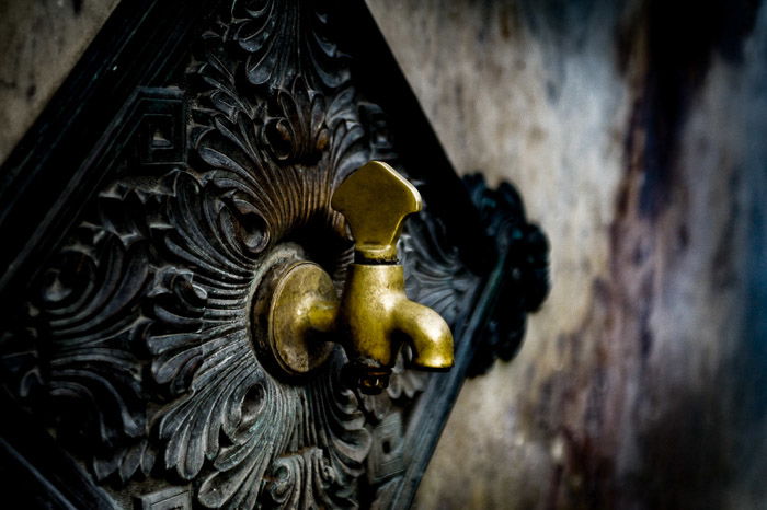 A grungy photo of a vintage faucet tap - edgy photography tips