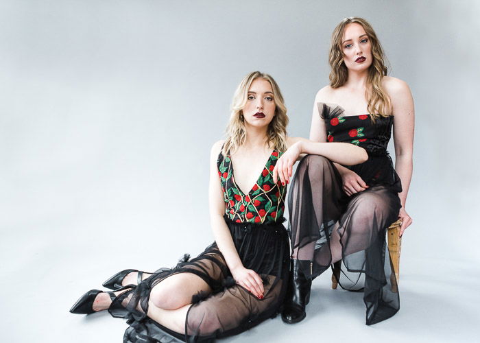 A studio portrait of two female models - photography studio equipment