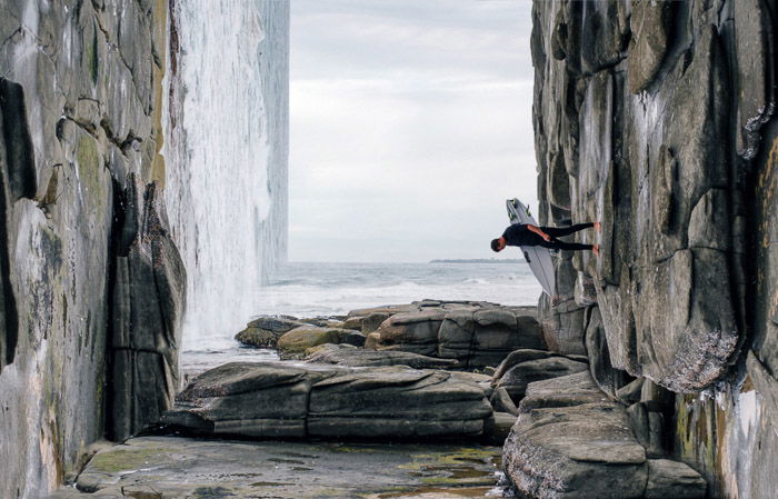 A screenshot showing how to Do a Bend and Warp Trick in Photoshop - surreal photo of a surfer on a square beach