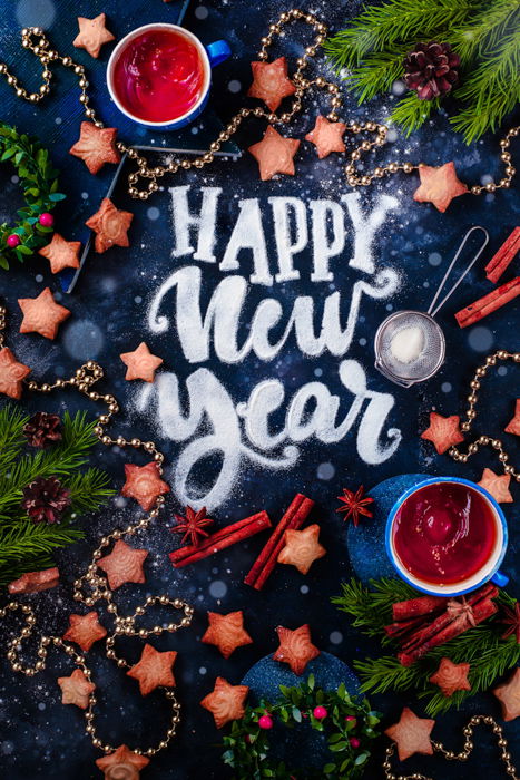 Festive food flat lay including cookiesand Christmas decorations