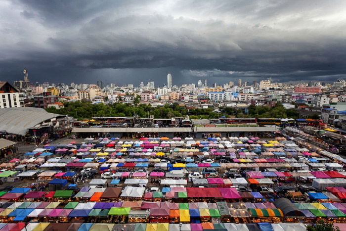 An aerial view of the roofs of colored building