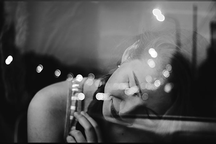 Film noir photography portrait of a female model in monochrome