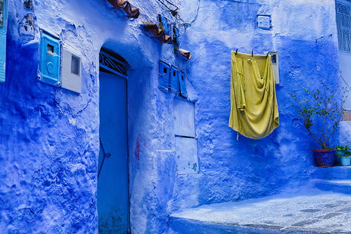 Chefchaouen, a Moroccan city filled with bright blue buildings - vibrant colorful photography