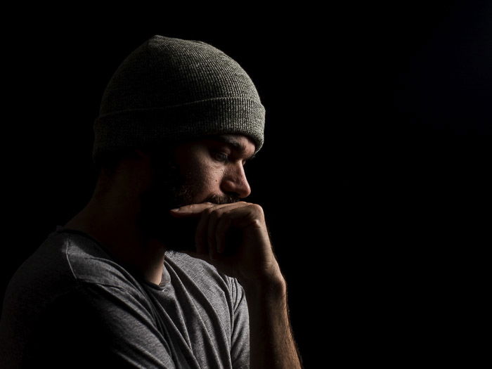 atmospheric portrait of a male model shot with short lighting techniques