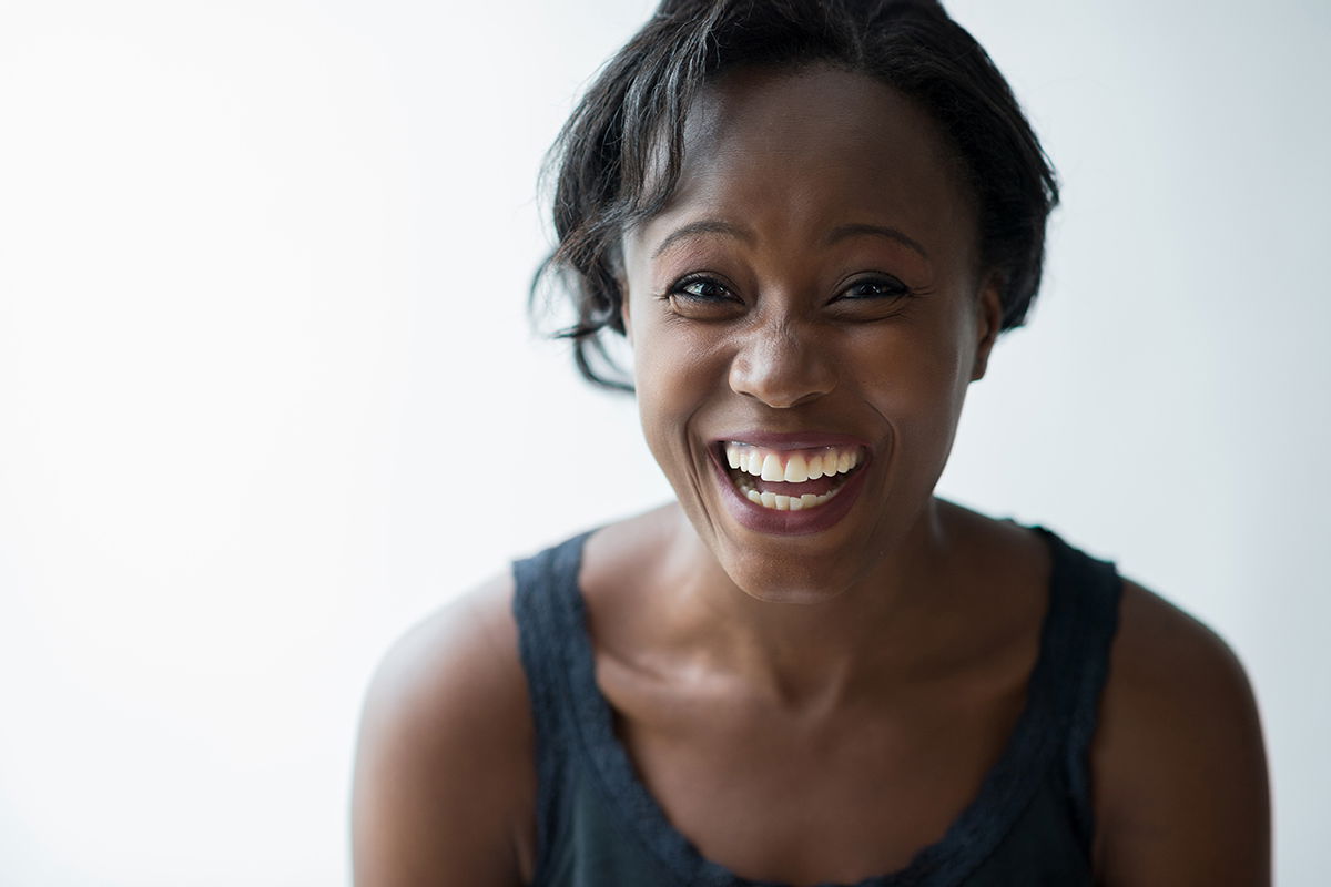 A portrait of a woman with a natural smile