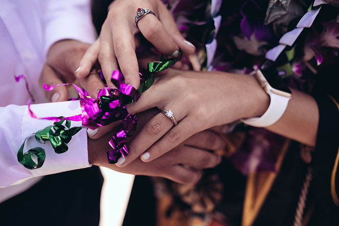 Beautiful close up graduation photography of students hands