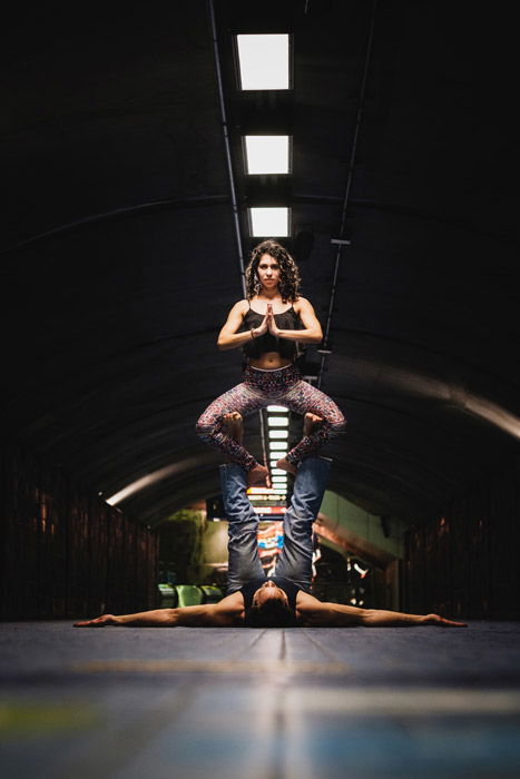 Atmospheric portrait of gymnastic performers onstage at a festival