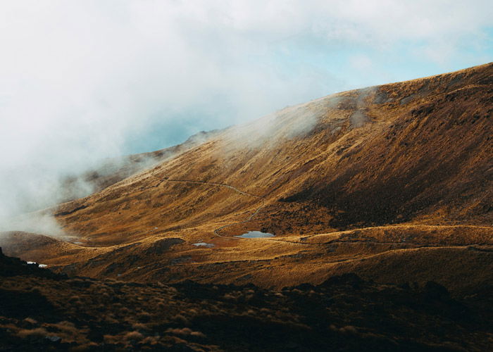 A stunning yellowed and brown mountainous landscape - color theory for landscape photography