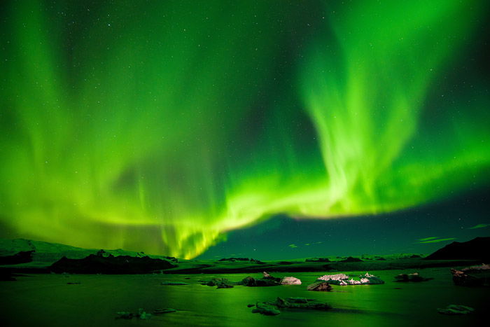 the norther nights over a seascape - stunning landscape photos 