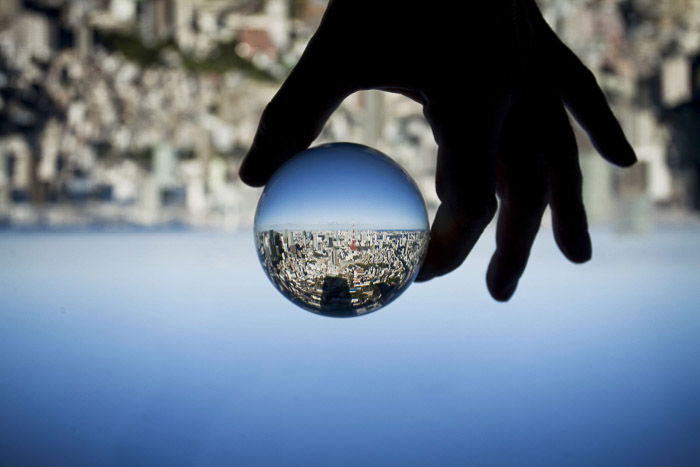 Creative cityscape taken using a lensball for refraction, and is held in front of the camera.