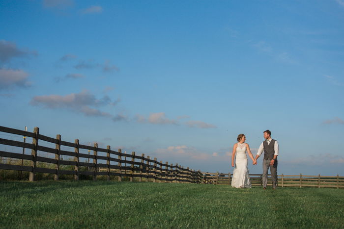 bright and airy wedding photography of a couple posing casually outdoors