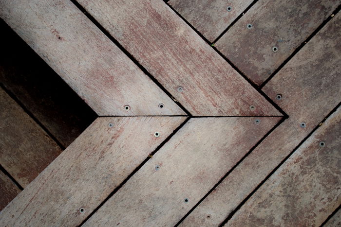 a photo of wooden floorboards with decreased clarity to blur the wood texture - clarity tool lightroom