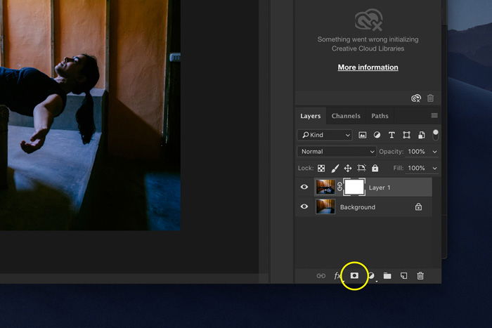 A Photoshop screenshot with the "Create a layer mask" icon highlighted at the bottom