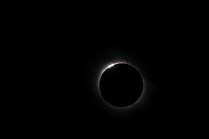 Stunning astrophotography shot of the Moon completely blocking the Sun