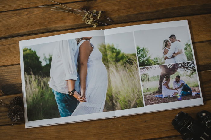 a photography portfolio on a wooden photography backdrop 