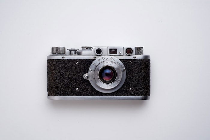 a vintage camera on white background